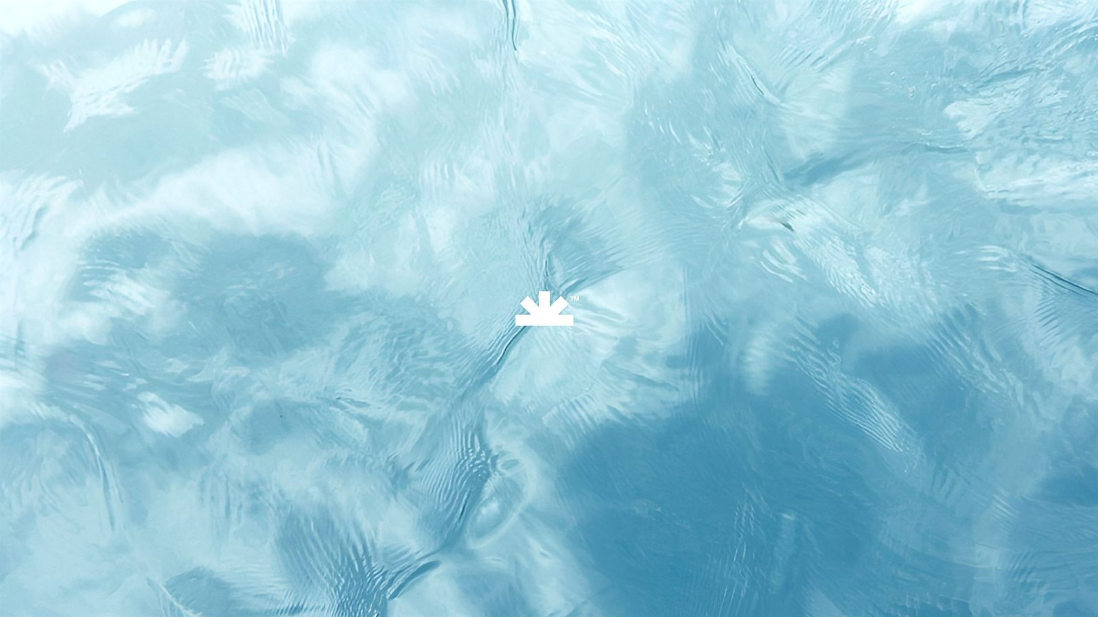 Horizon Creative Studio mark over rippling blue water